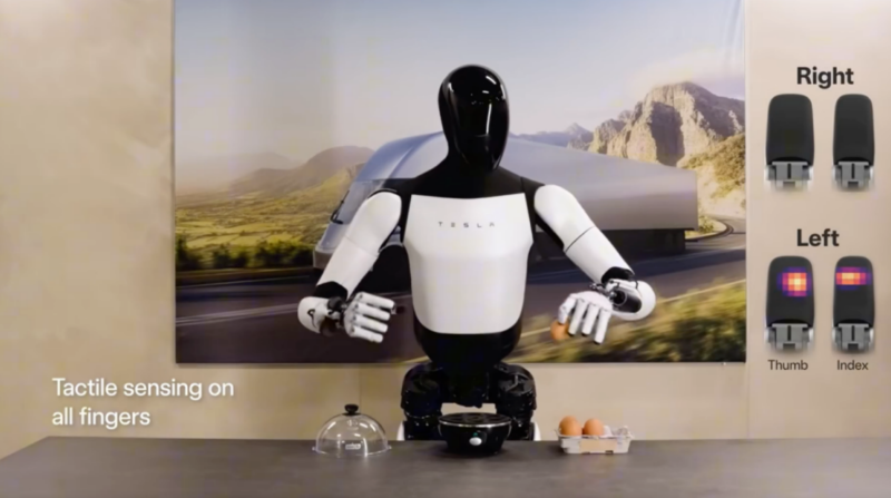 人形机器人手拿鸡蛋